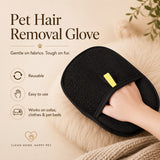 Nuzzo FurLift black mesh pet hair removal glove being used on a soft surface to clean up fur