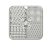 Nuzzo grey silicone slow feed dog lick mat with four textured quadrants for enrichment and anxiety relief
